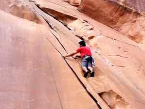 Yes, he's using tongs to climb