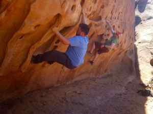 Impromptu bouldering behind the Navajo Arch in Arches National Park