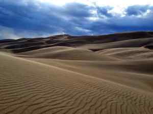 A picture of the dunes with foreboding clouds
