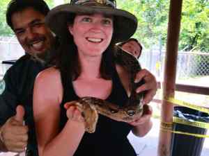 Bev is photo bombing in the back. I think she wants to hold the snake.