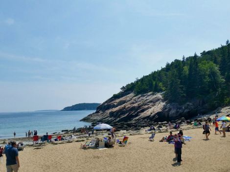 A view of Sand Beach with the rocky cliffs
